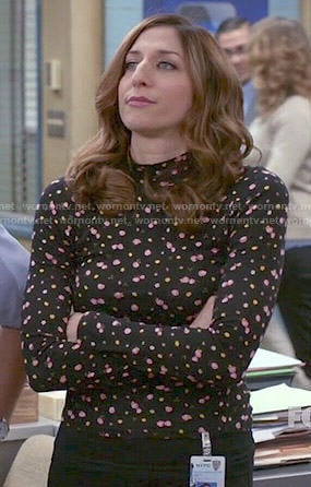 Gina's black floral mock-neck top on Brooklyn Nine-Nine