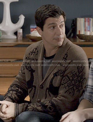 Jake's brown reindeer cardigan on Marry Me