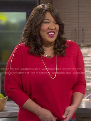 Yolanda’s red zip-shoulder sweater on Young and Hungry