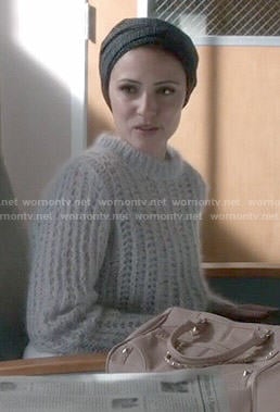 April's grey fluffy sweater on Chasing Life