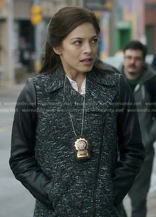 Cat’s tweed coat with leather sleeves on Beauty and the Beast