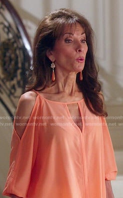 Genevieve’s orange cold shoulder top on Devious Maids