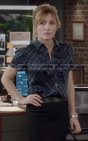 Maura's blue checked ruffled top on Rizzoli and Isles