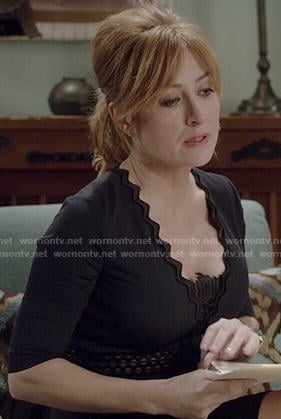 Maura’s navy zig zag trim dress on Rizzoli and Isles