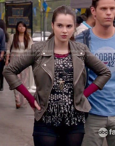 Bay’s black and white printed fringed top and leather jacket on Switched at Birth