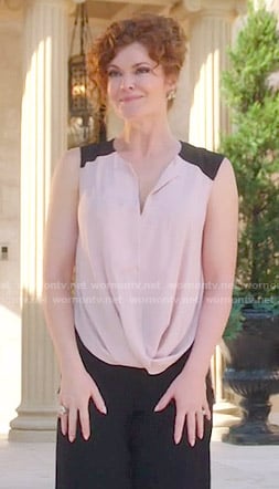 Evelyn’s draped blouse with contrast shoulders on Devious Maids