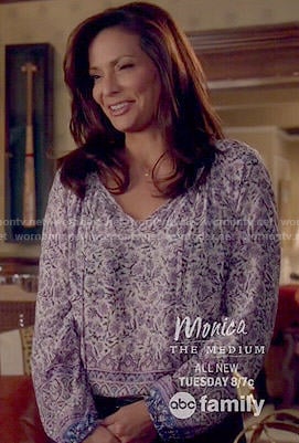 Regina's purple floral blouse on Switched at Birth