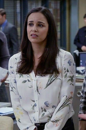 Amy's white floral v-neck blouse on Brooklyn Nine-Nine