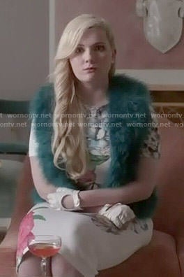 Chanel 5's floral dress and teal fur vest on Scream Queens