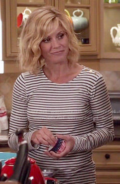 Claire's striped top with shoulder buttons on Modern Family
