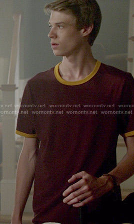 Joe's burgundy tee with yellow trim on Under the Dome