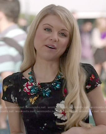 Lauren’s black floral cap sleeved dress on Faking It