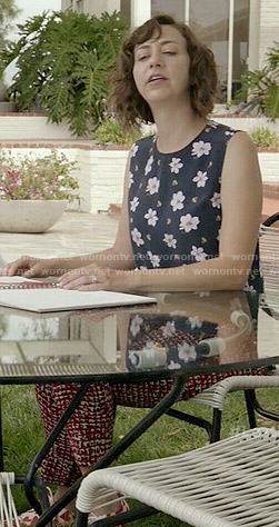 Carol's navy floral sleeveless top on Last Man on Earth