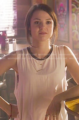 Carter's white muscle tank with black trim on Finding Carter