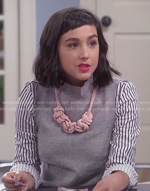 Mandy’s striped shirt and pink knotted necklace on Last Man Standing