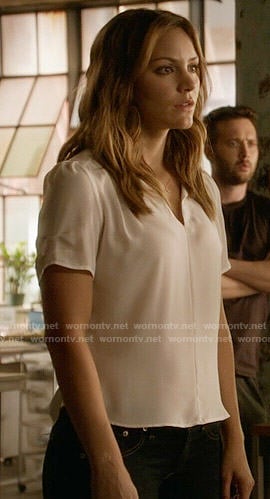 Paige's white split-neck blouse on Scorpion