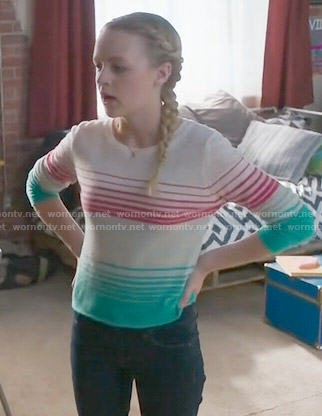 Taylor’s pink and green striped sweater on Finding Carter