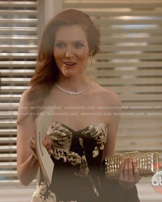 Abby’s black and gold strapless gown on Scandal