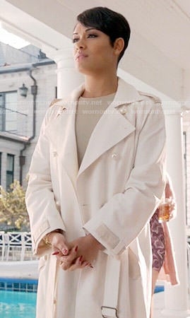 Anika's white trench coat with pearl buttons on Empire