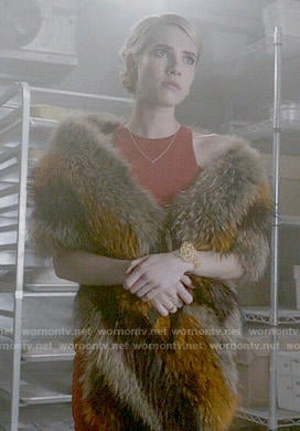 Chanel’s red asymmetric dress and fur stole on Scream Queens