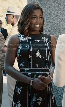 Daisy's black floral dress with white trim on Madam Secretary