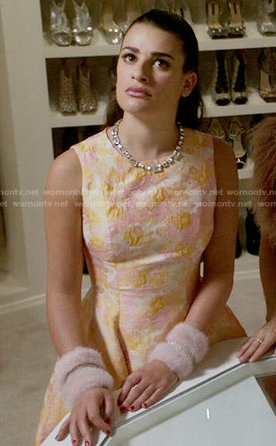 Hester’s orange and pink floral jacquard dress on Scream Queens