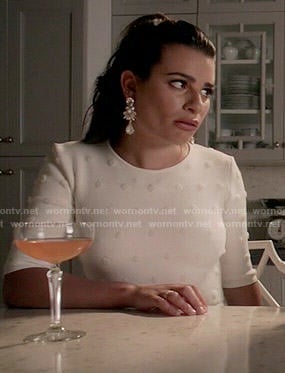 Hester’s white polka dot crop top and skirt set on Scream Queens