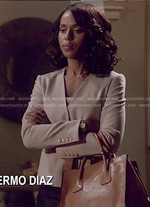 Olivia's wrap jacket and tan bag on Scandal