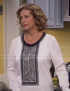 Vanessa's white blouse with black lace front on Last Man Standing