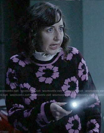 Carol's black and pink floral sweater on Last Man on Earth