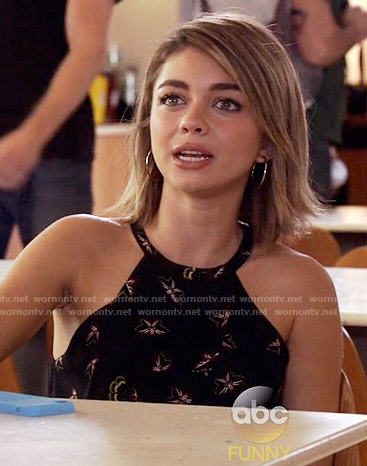 Haley's black printed top on Modern Family