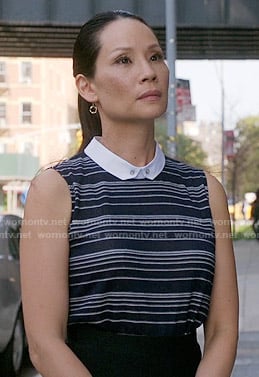 Joan's navy blue striped top with collar on Elementary