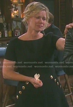 Kayla’s black dress with gold buttons on Days of our Lives
