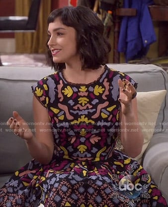 Mandy's black dress with multi colored pattern on Last Man Standing