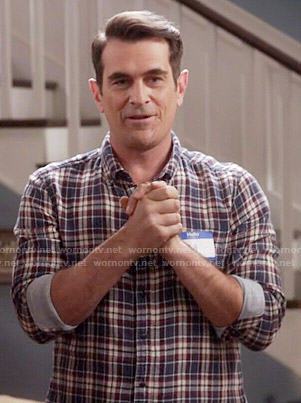 Phil's blue and red plaid shirt on Modern Family