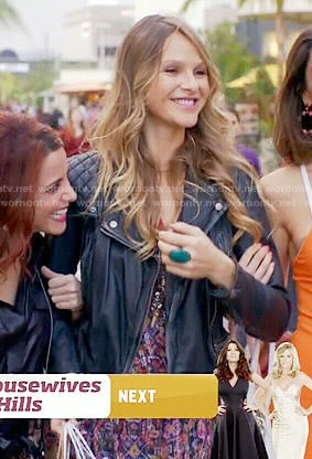 Phoebe’s printed dress and leather jacket on Girlfriends Guide to Divorce