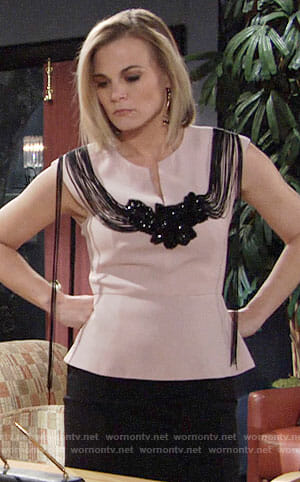 Phyllis’s pink peplum top with fringed back on The Young and the Restless