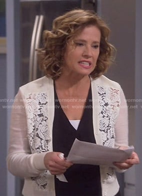 Vanessa’s white lace front cardigan on Last Man Standing