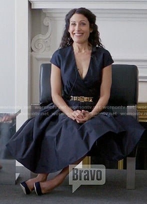 Abby’s navy blue wrap dress on Girlfriends Guide to Divorce