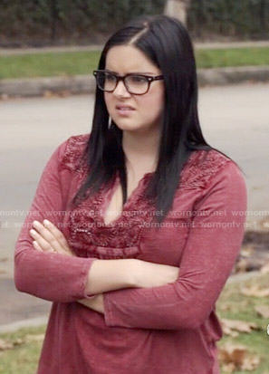 Alex’s red lace panel top on Modern Family