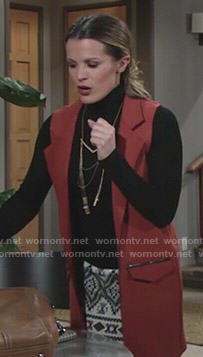 Chelsea's long orange vest on The Young and the Restless