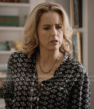 Elizabeth’s black flower printed blouse on Madam Secretary