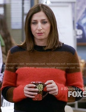 Gina’s orange, brown and navy striped sweater on Brooklyn Nine-Nine