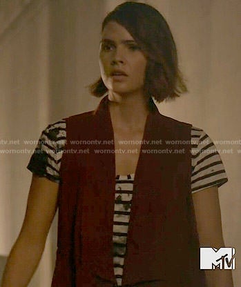 Malia’s striped and splatter print tee and red vest on Teen Wolf