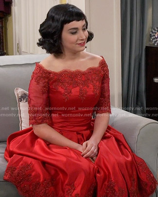 Mandy’s red lace off-shoulder dress on Last Man Standing