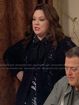 Molly's black words print blouse and crochet cardigan on Mike and Molly