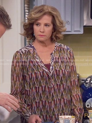 Vanessa’s chevron print blouse on Last Man Standing