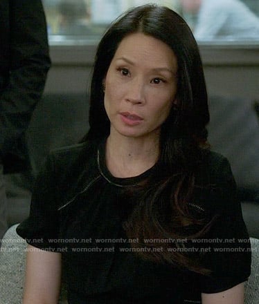 Joan's black short sleeved dress on Elementary