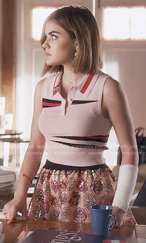 Aria’s pink cropped polo top and floral sequin skirt on Pretty Little Liars