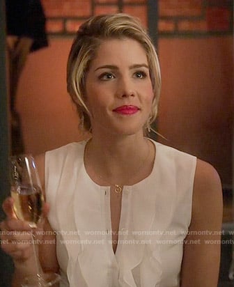 Felicity's white sleeveless ruffled top on Arrow